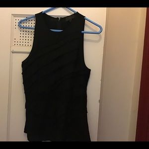 Black sleeveless layered front blouse with slight A line bottom